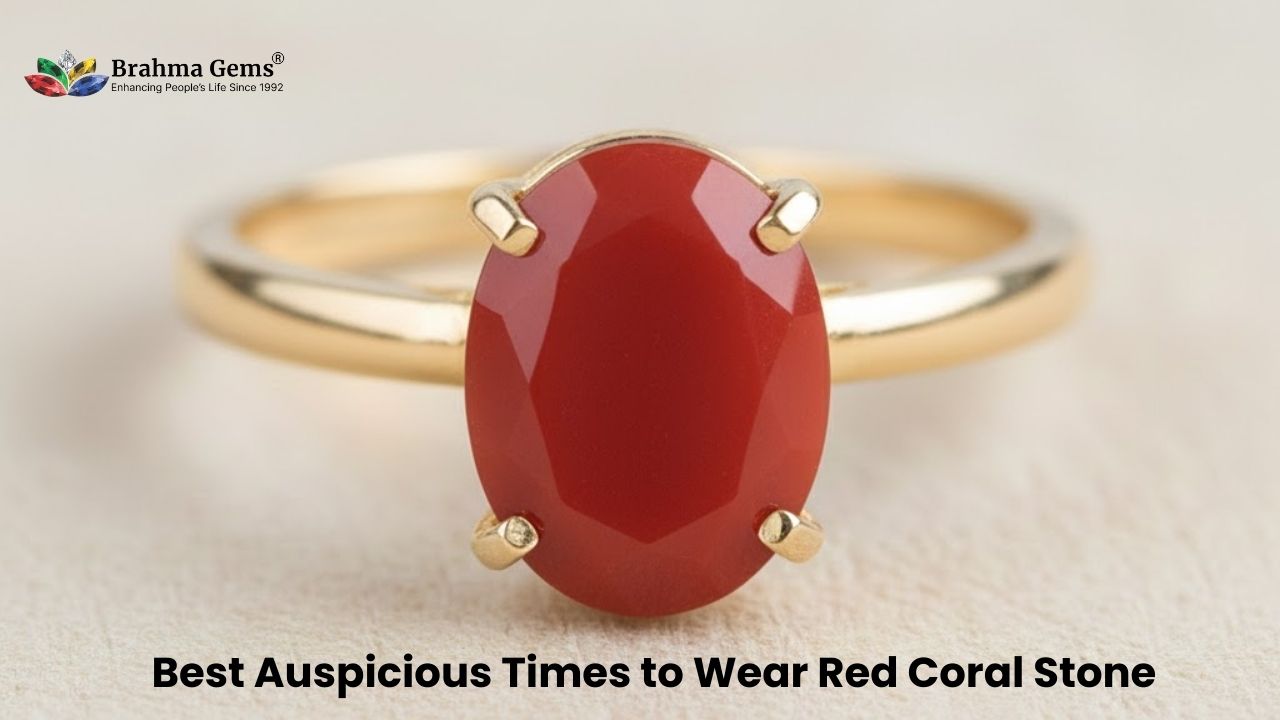 Red coral ring against galaxy background with blurred clock