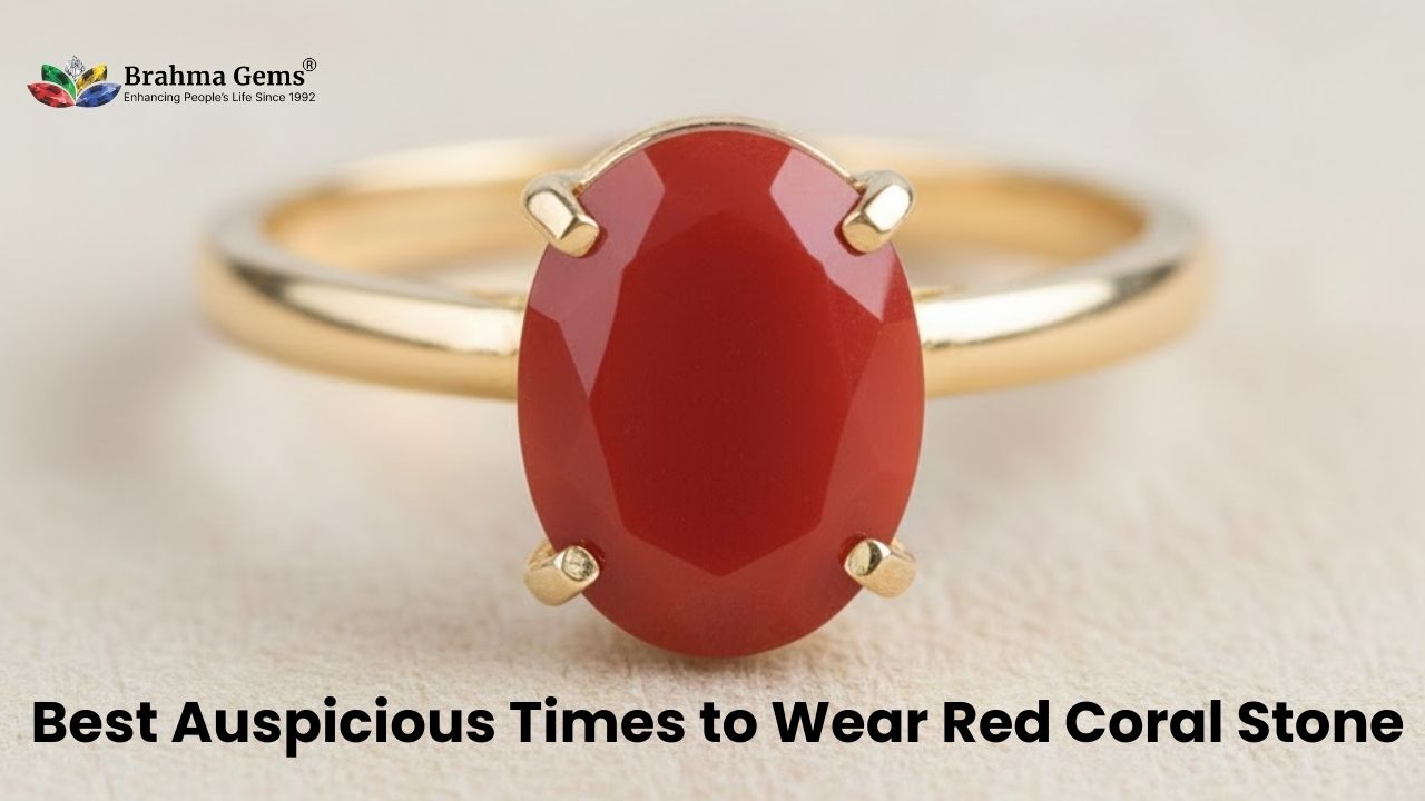Red coral ring against galaxy background with blurred clock